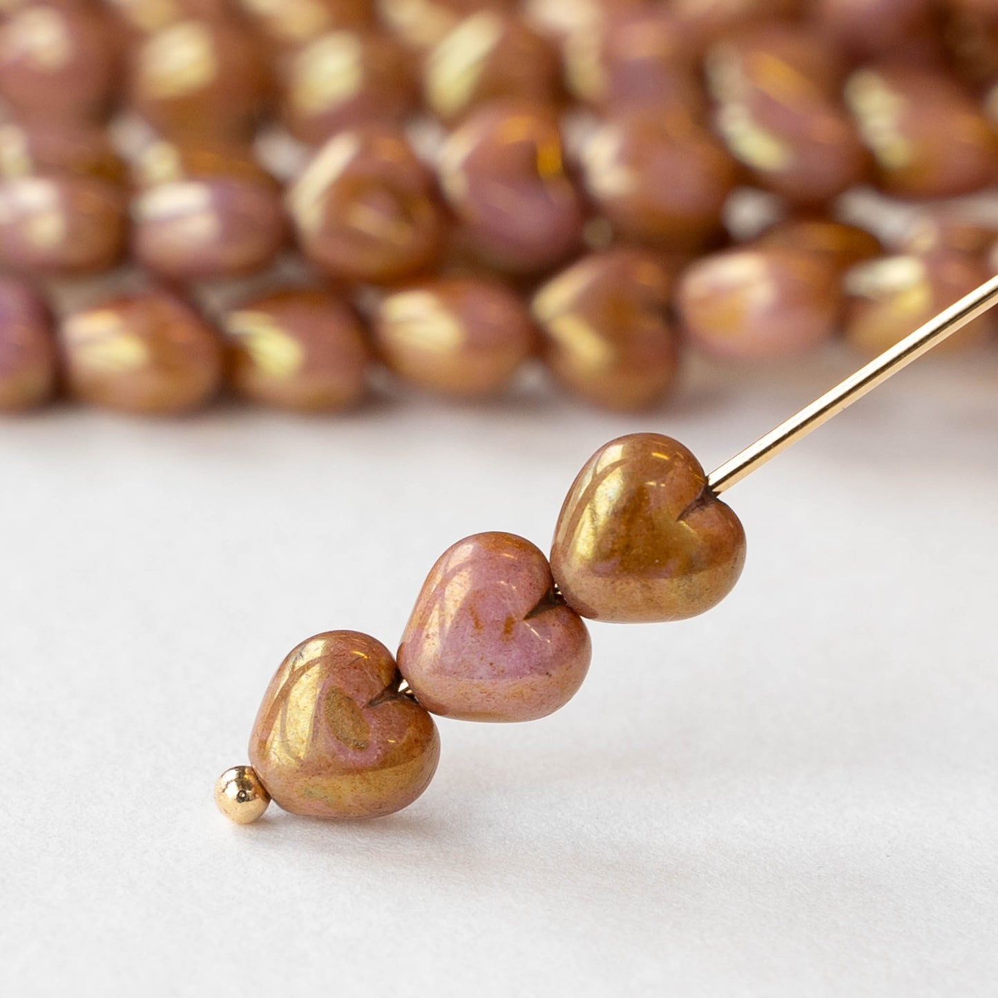 6mm Glass Heart Beads - Opaque Rose Gold Topaz - 25 hearts