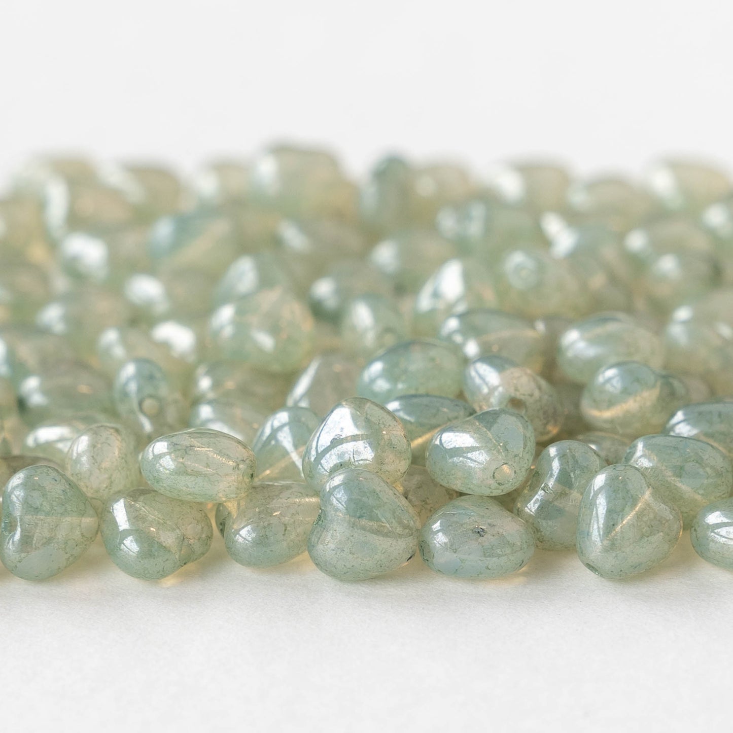 6mm Glass Heart Beads - Transparent Light Green Luster - 25 hearts