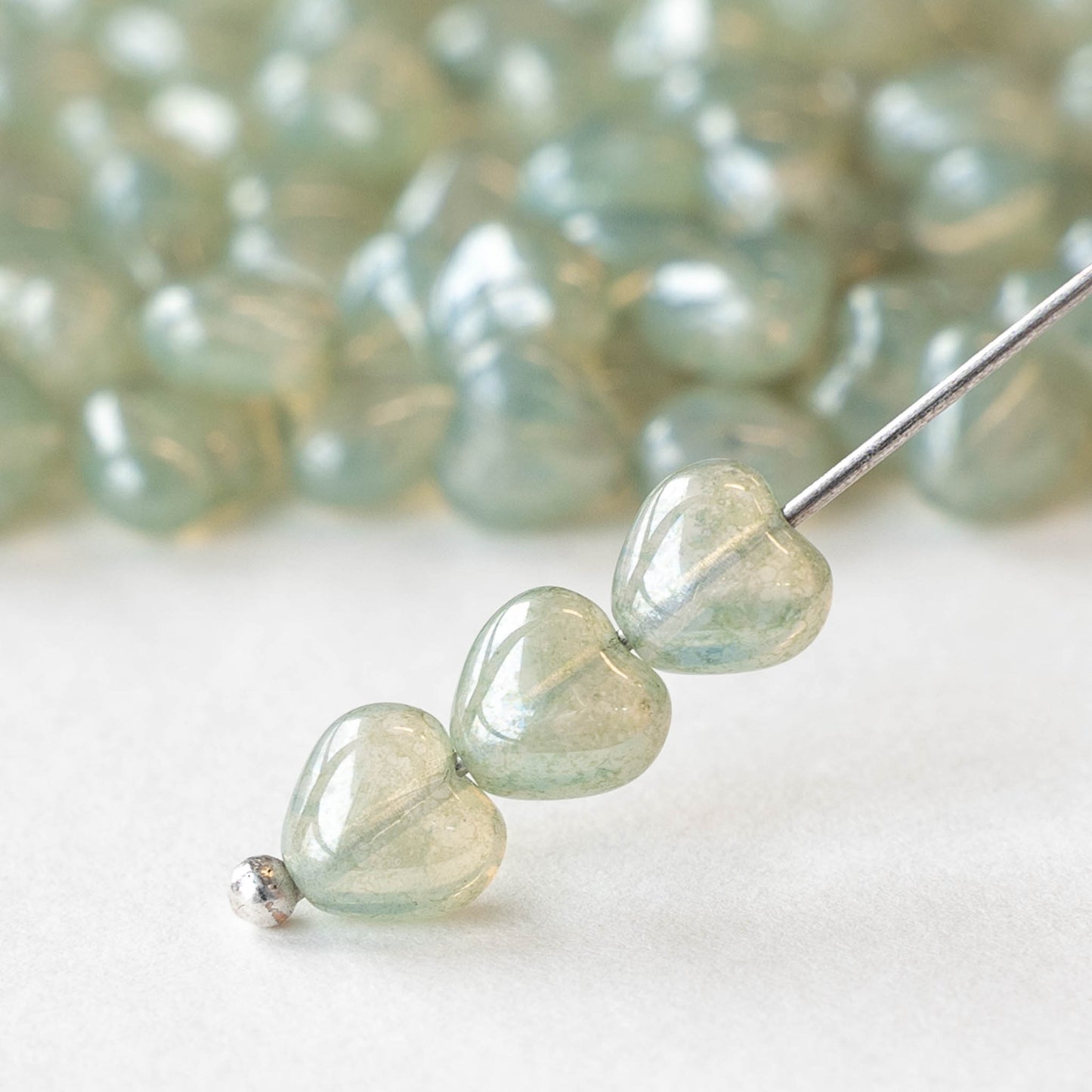 6mm Glass Heart Beads - Transparent Light Green Luster - 25 hearts