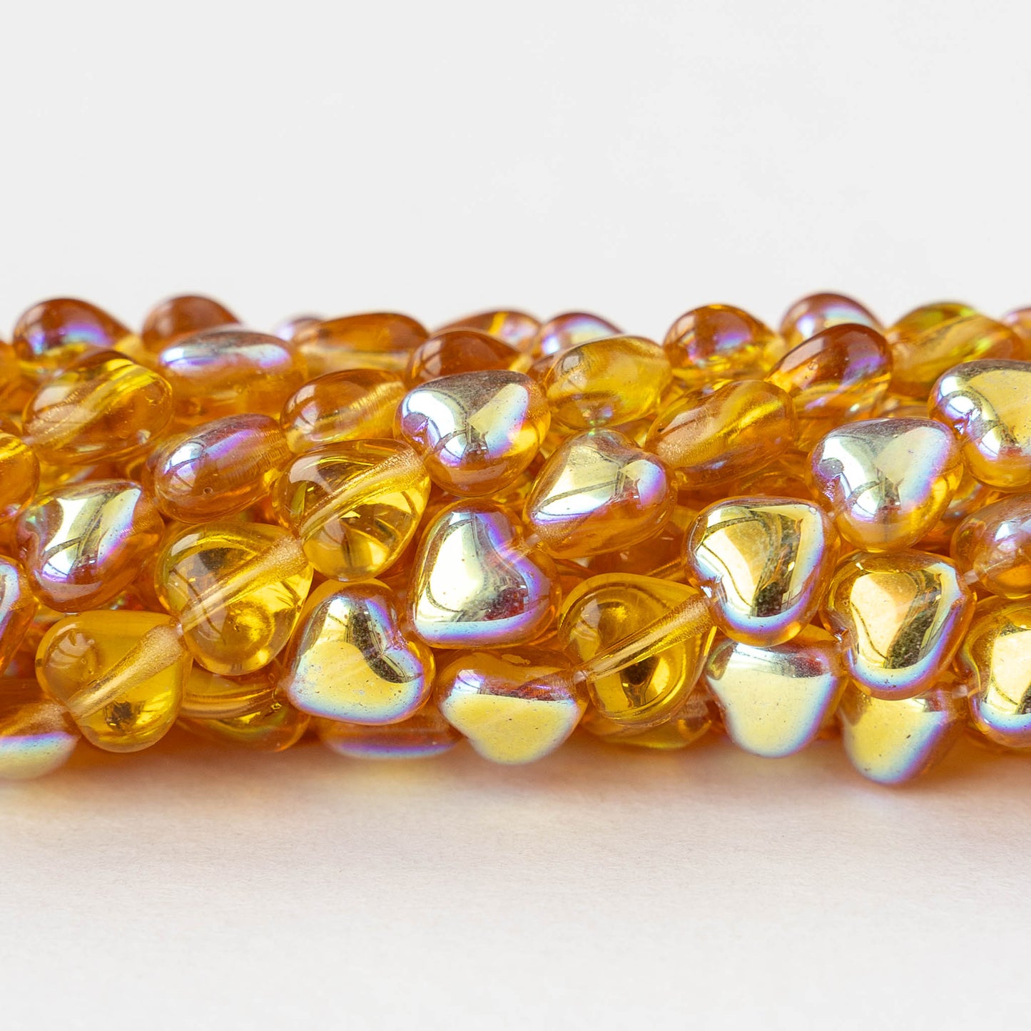 6mm Glass Heart Beads - Topaz AB - 50 hearts