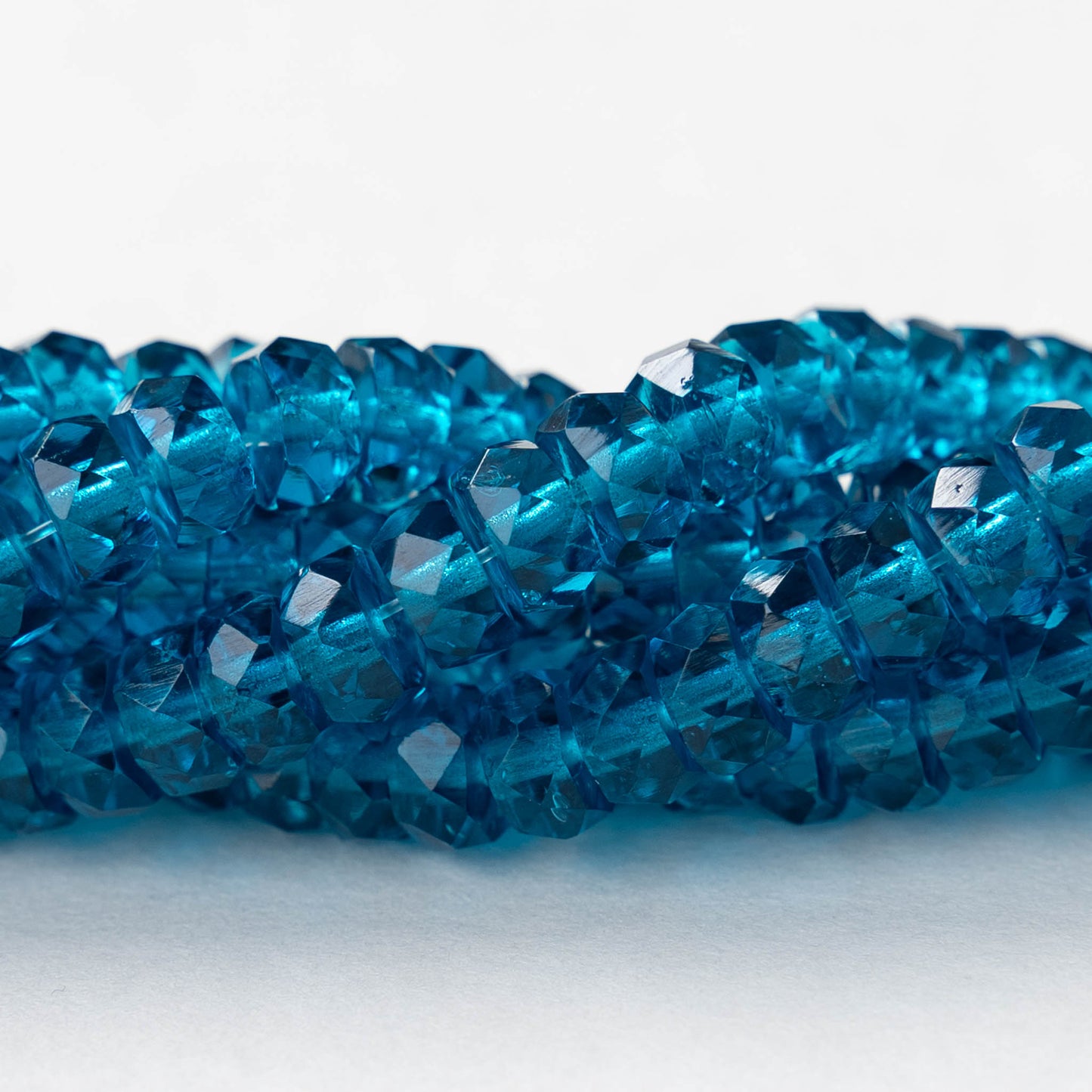 6mm Firepolished Glass Heishi Beads - Transparent Teal - 50 Beads