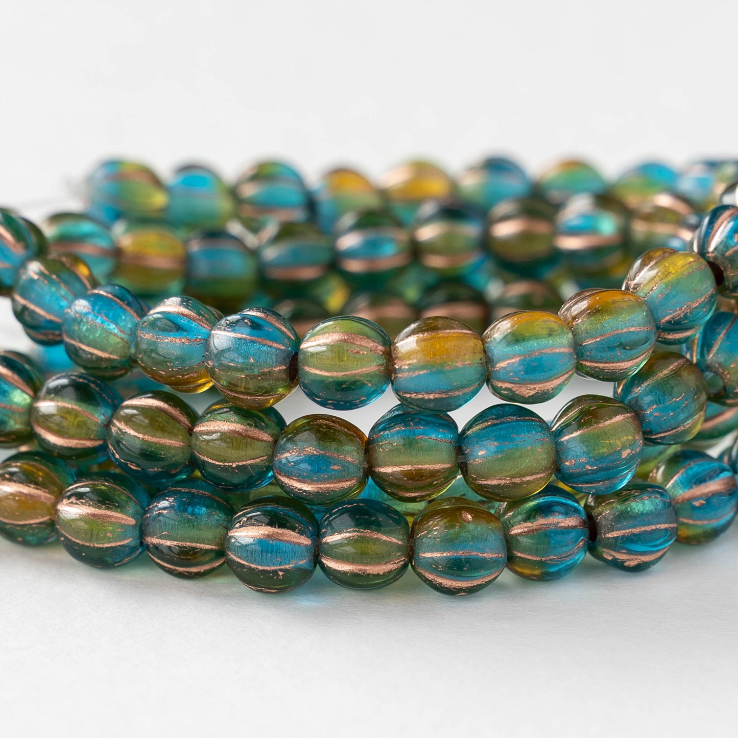 6mm Melon Bead - Teal Amber Mix with Copper Wash - 25 beads