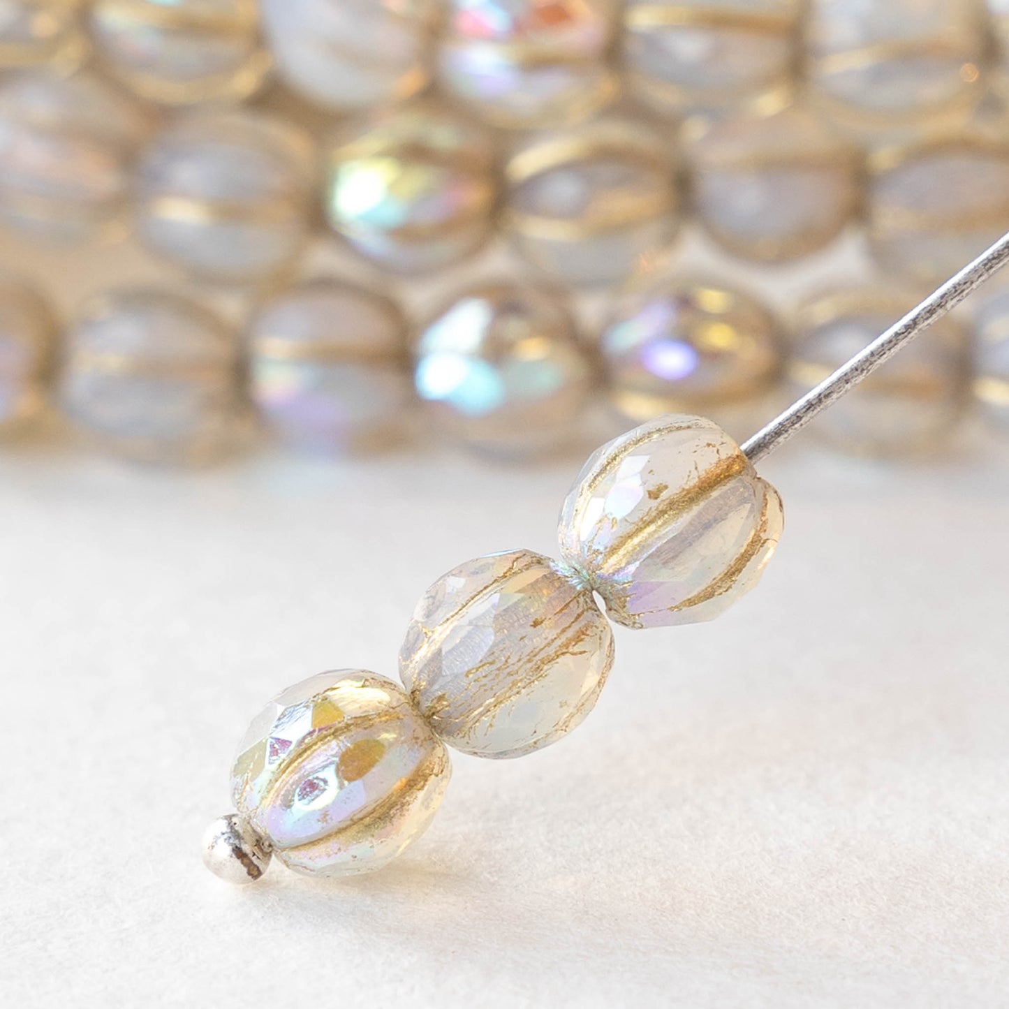 6mm Faceted Round Glass Melon Bead - Crystal Opal AB with Gold Wash - 10 or 20 Beads