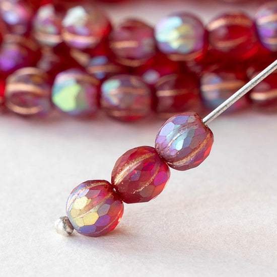 6mm Faceted Round Glass Melon Bead - Transparent Red AB with a Gold Wash - 10 or 20 Beads