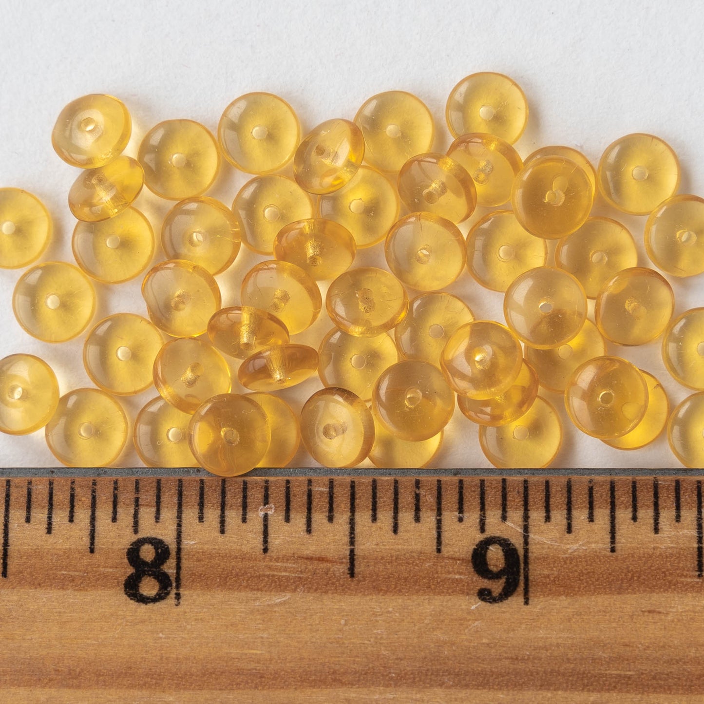 Load image into Gallery viewer, 6mm Glass Rondelle Beads - Light Amber - 100 Beads
