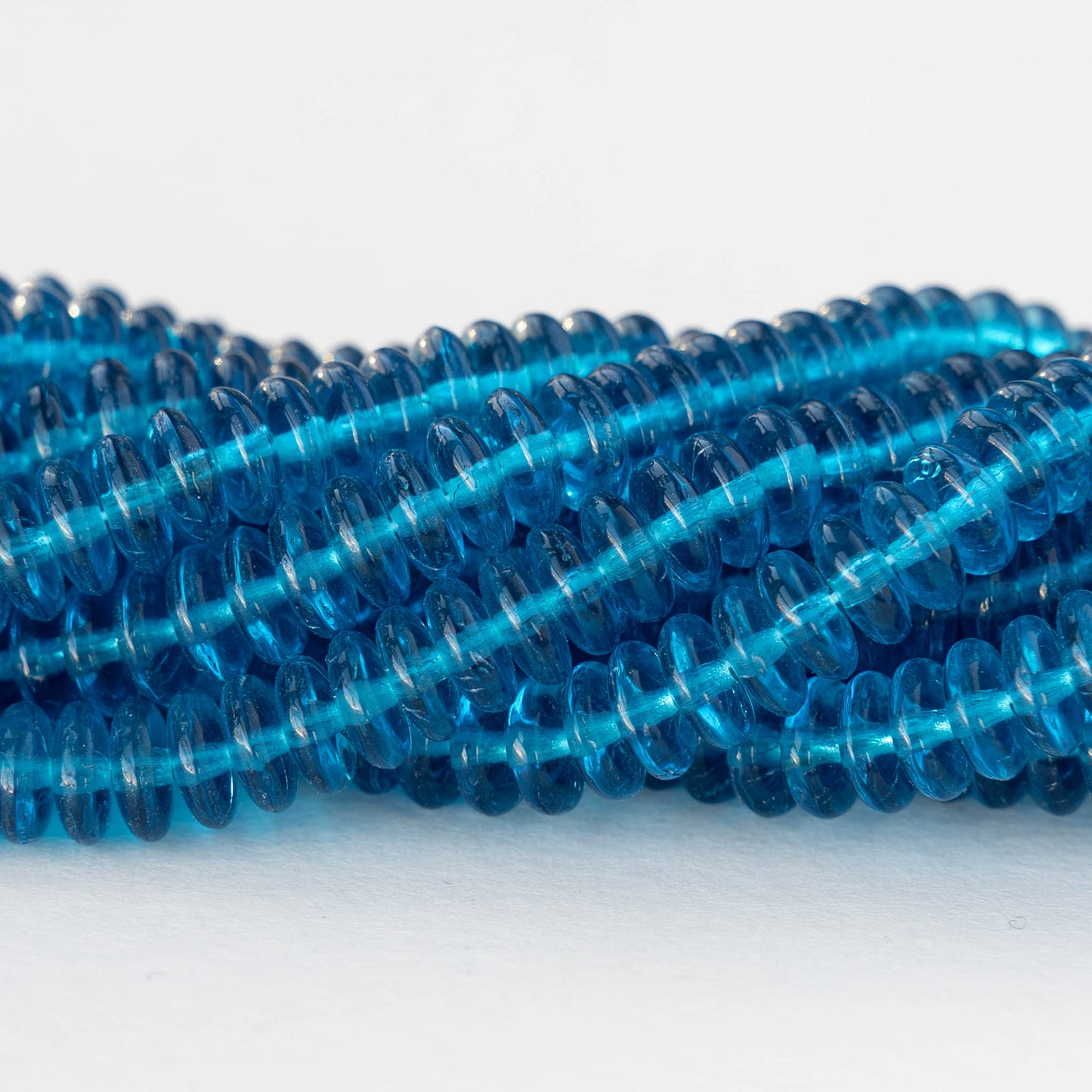 6mm Glass Rondelle Beads - Transparent Dark Aqua - 50 or 100 Beads