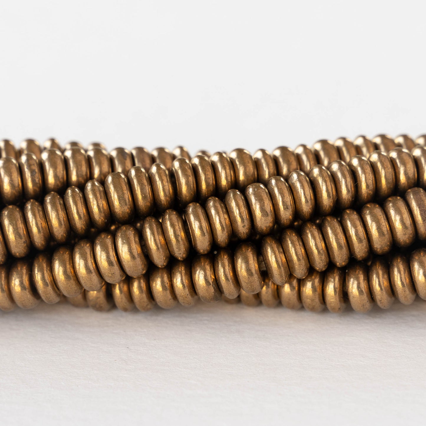 6.5mm Antique Gold Plated Brass Rondelle Beads - 40