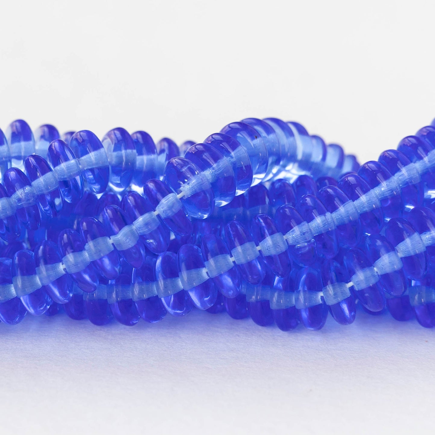 6mm Glass Rondelle Beads - Transparent Sapphire Blue - 50 or 100 Beads