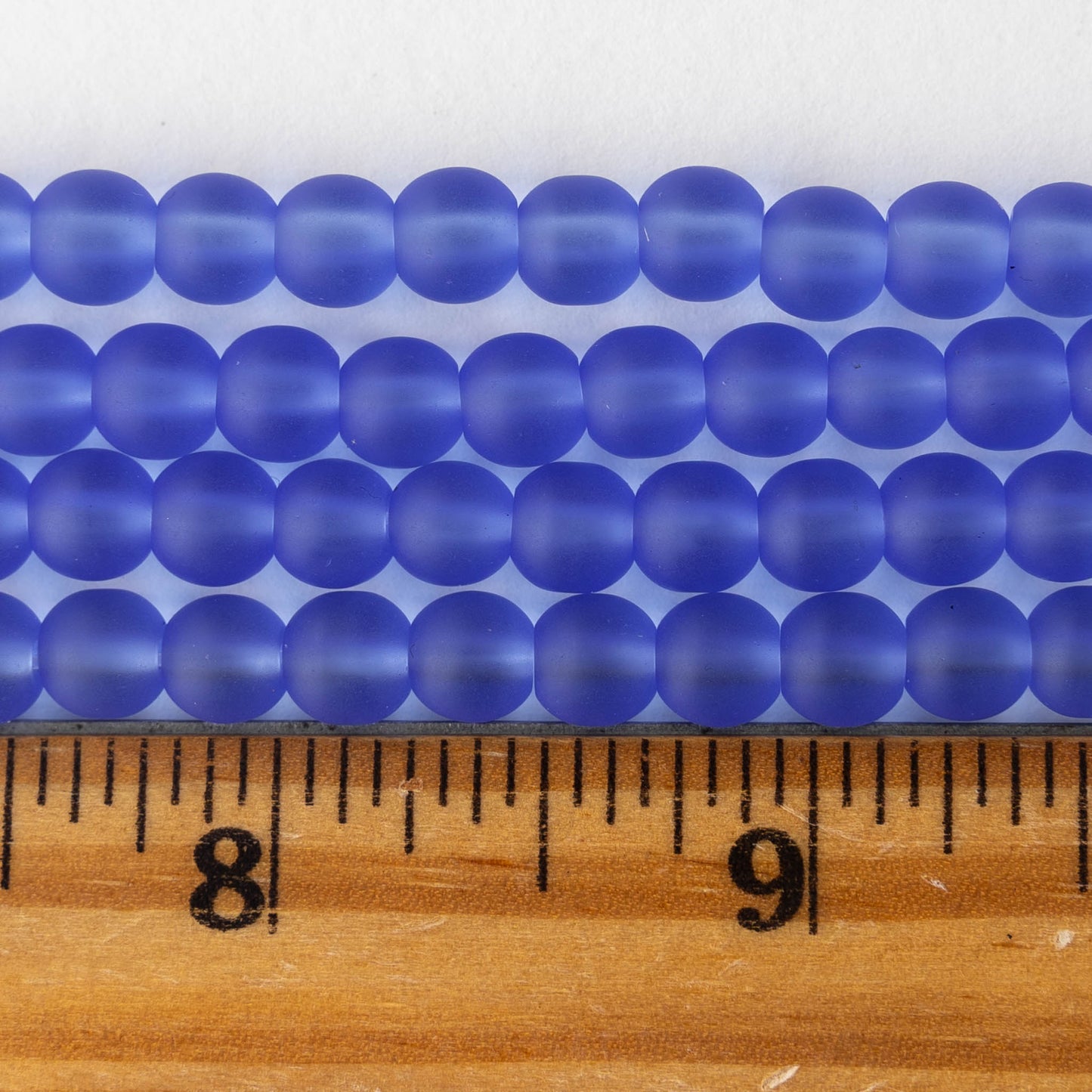 5x7mm Glass Teardrop Beads - Lt,. Sapphire Blue- 75 Beads