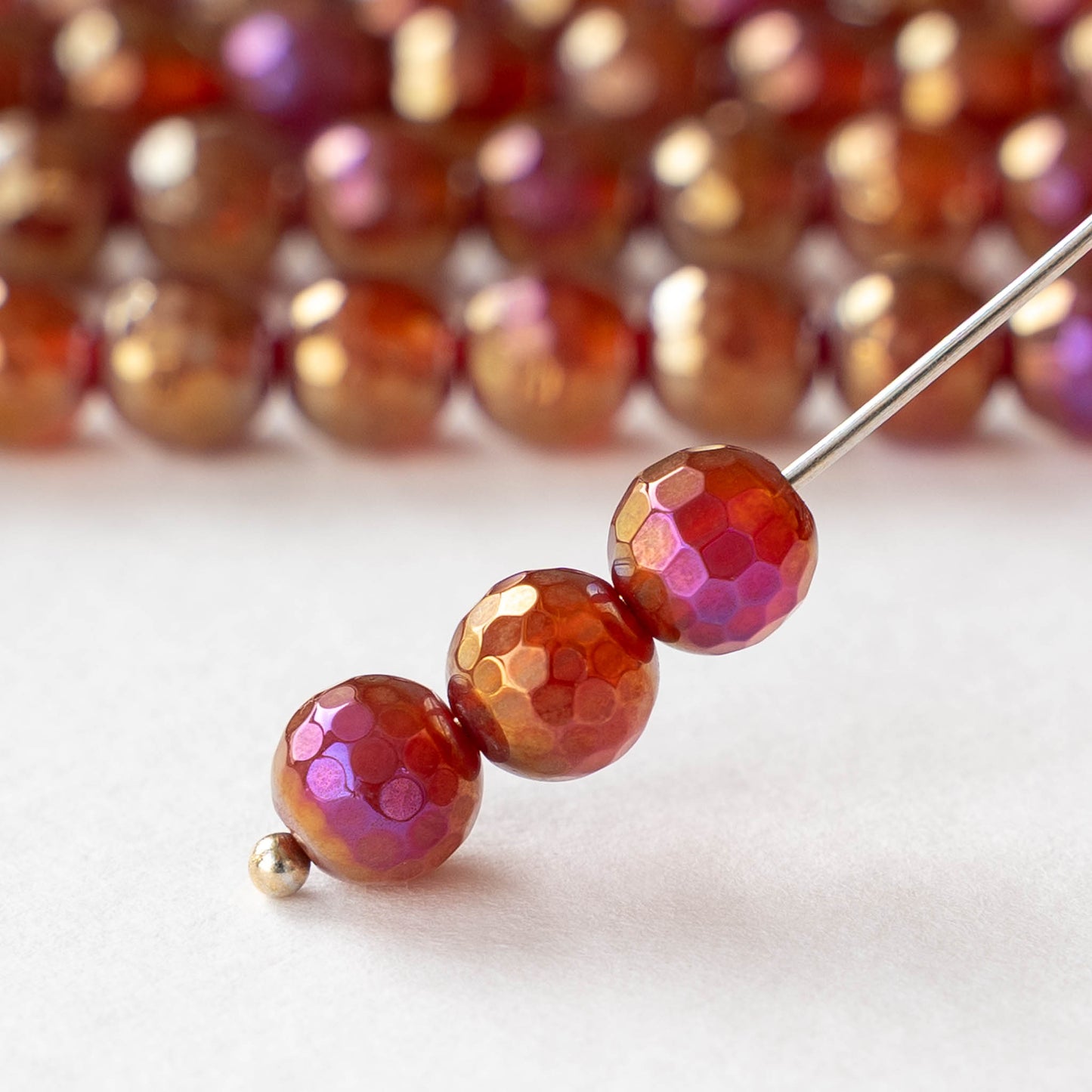 6mm Round Faceted Plated Carnelian Beads - Whole or Half Strand
