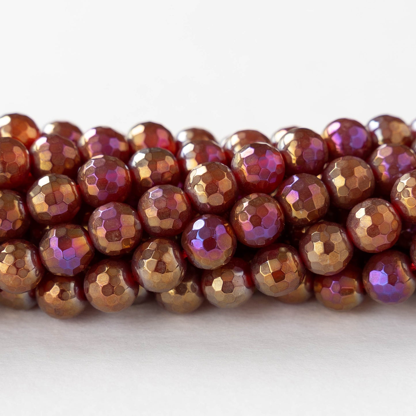 6mm Round Faceted Plated Carnelian Beads - Whole or Half Strand