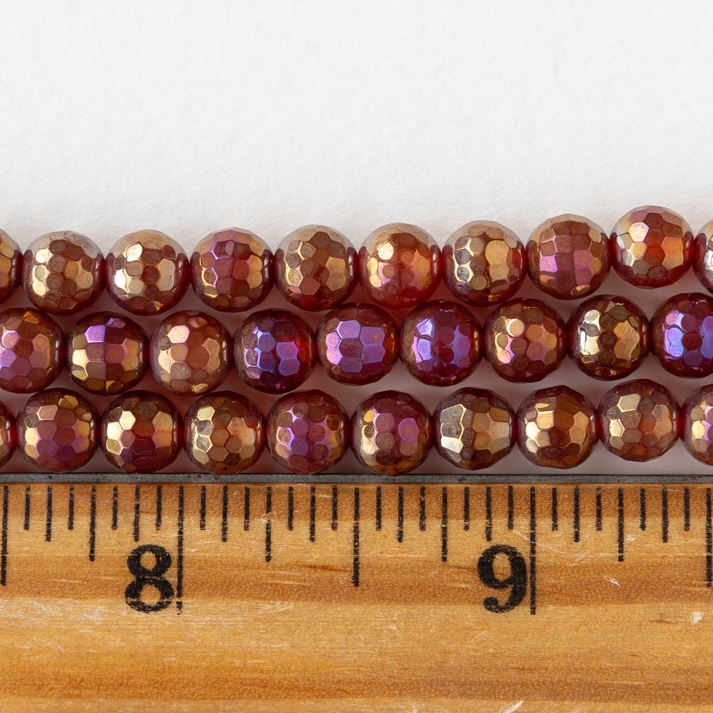 6mm Round Faceted Plated Carnelian Beads - Whole or Half Strand
