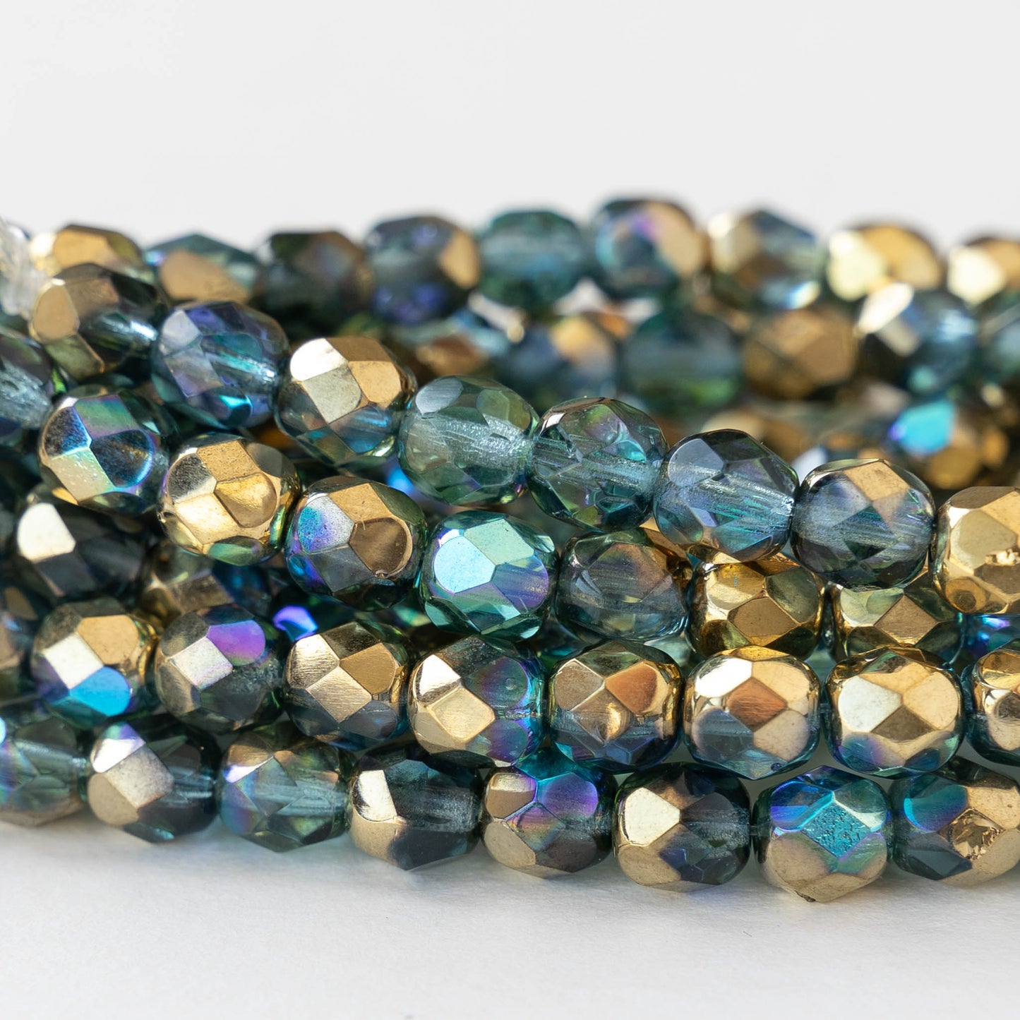 6mm Round Firepolished Beads - Transparent Lt. Aqua Gold AB - 25 Beads