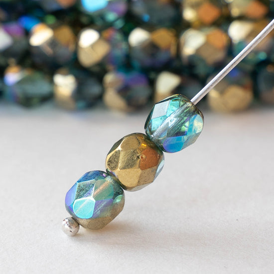 6mm Round Firepolished Beads - Transparent Lt. Aqua Gold AB - 25 Beads