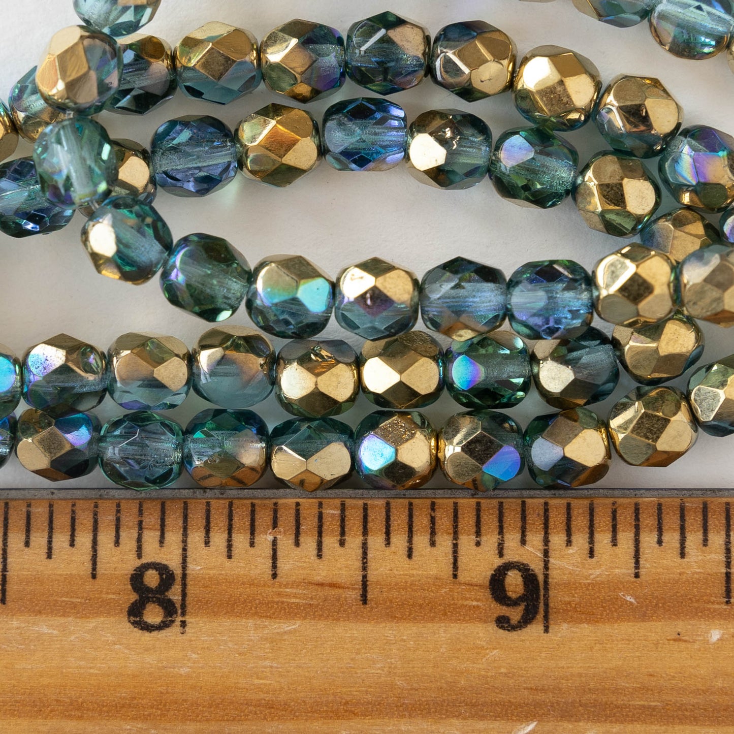 6mm Round Firepolished Beads - Transparent Lt. Aqua Gold AB - 25 Beads