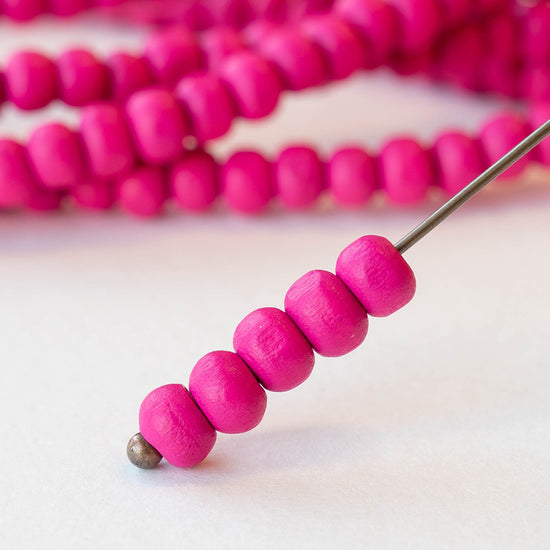 6mm Round Wood Beads - Pink - 15 inch strand ~85 beads