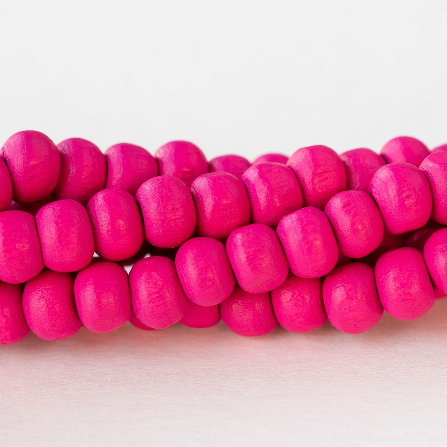 6mm Round Wood Beads - Pink - 15 inch strand ~85 beads