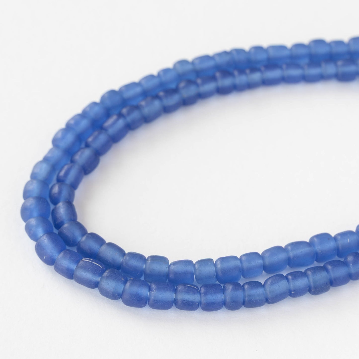 Glass Java Beads - Transparent Sapphire - Whole or Half Strand