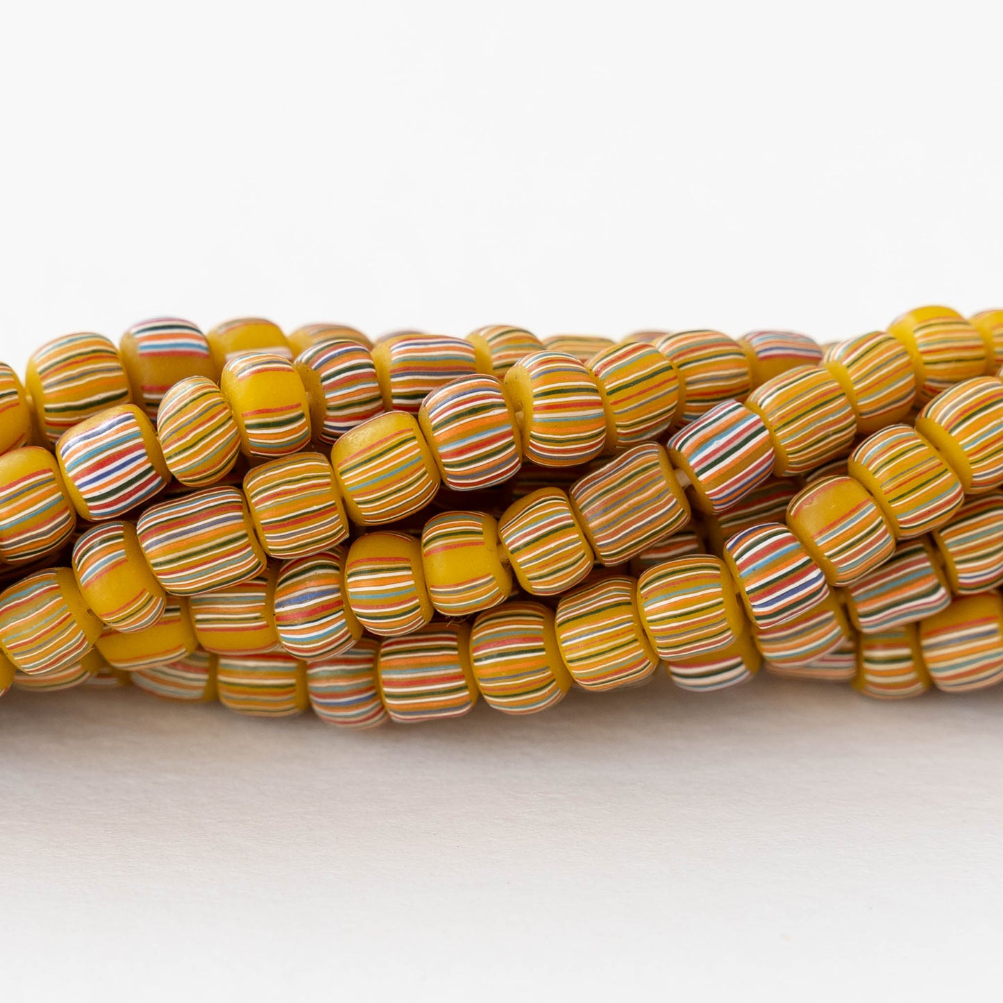 Glass Java Beads - Opaque Yellow with Colorful Stripes - Whole or Half Strand