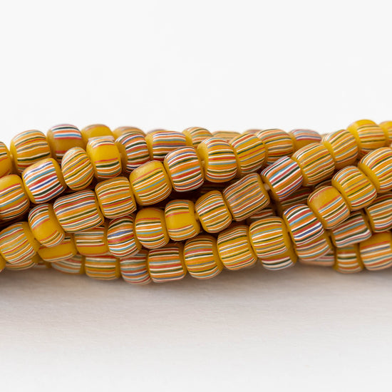 Glass Java Beads - Opaque Yellow with Colorful Stripes - Whole or Half Strand