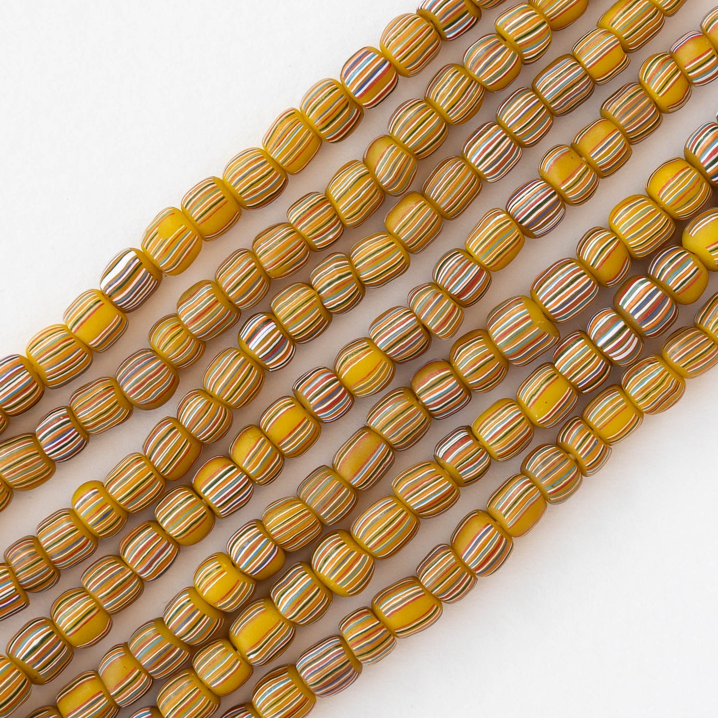 Glass Java Beads - Opaque Yellow with Colorful Stripes - Whole or Half Strand
