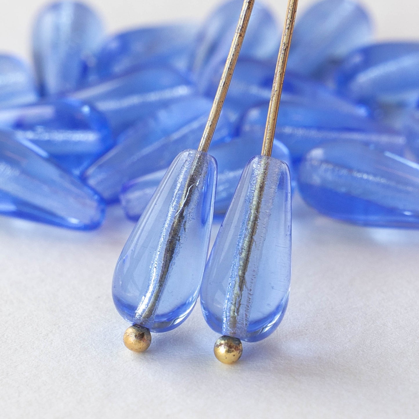Load image into Gallery viewer, 6x13mm Long Drilled Drops - Light Blue Glass Beads - 20 Beads
