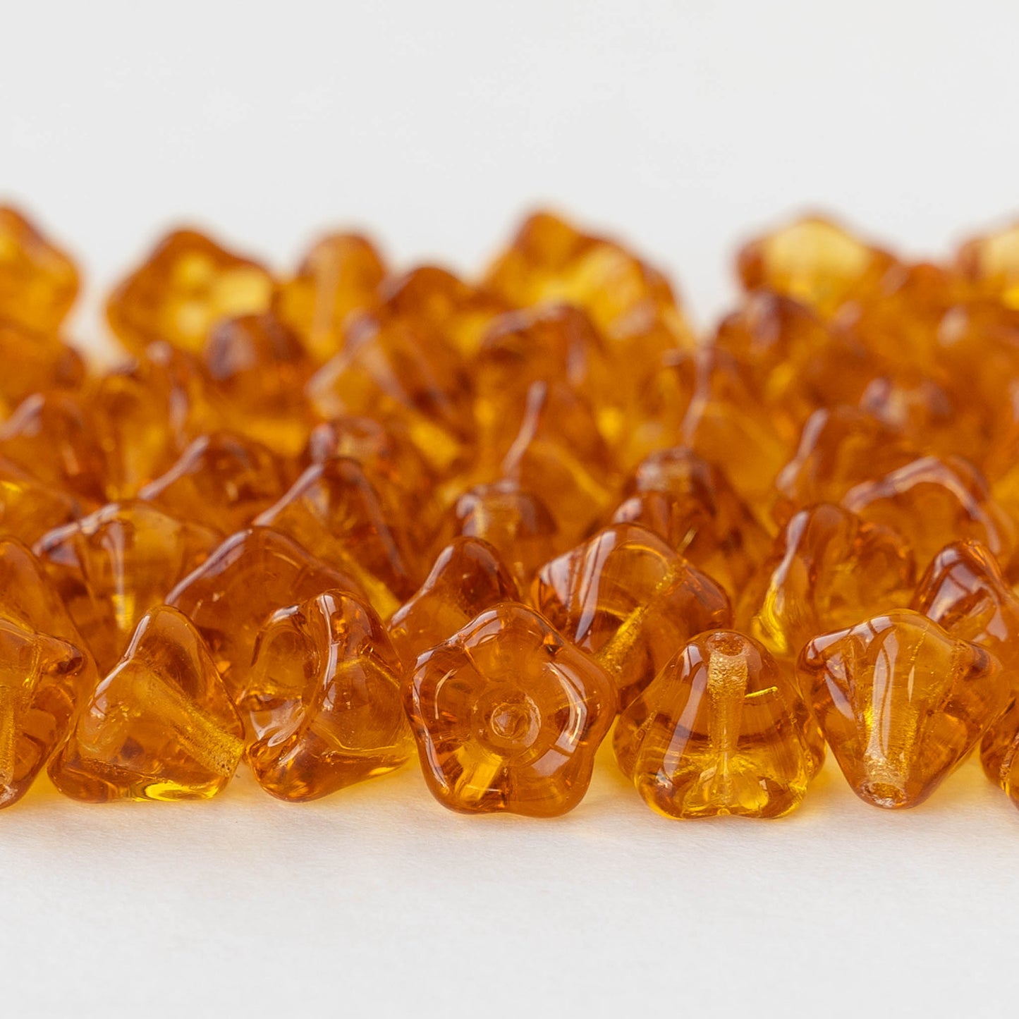 6x8mm Glass Flower Beads - Transparent Amber - 30 Beads