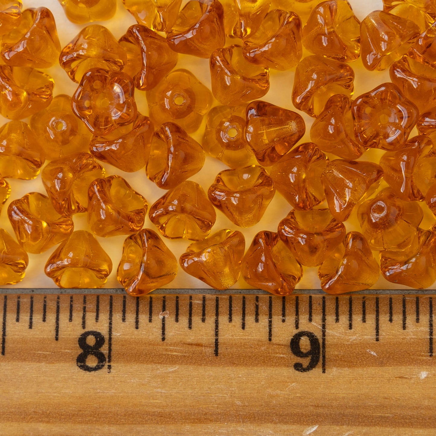 6x8mm Glass Flower Beads - Transparent Amber - 30 Beads