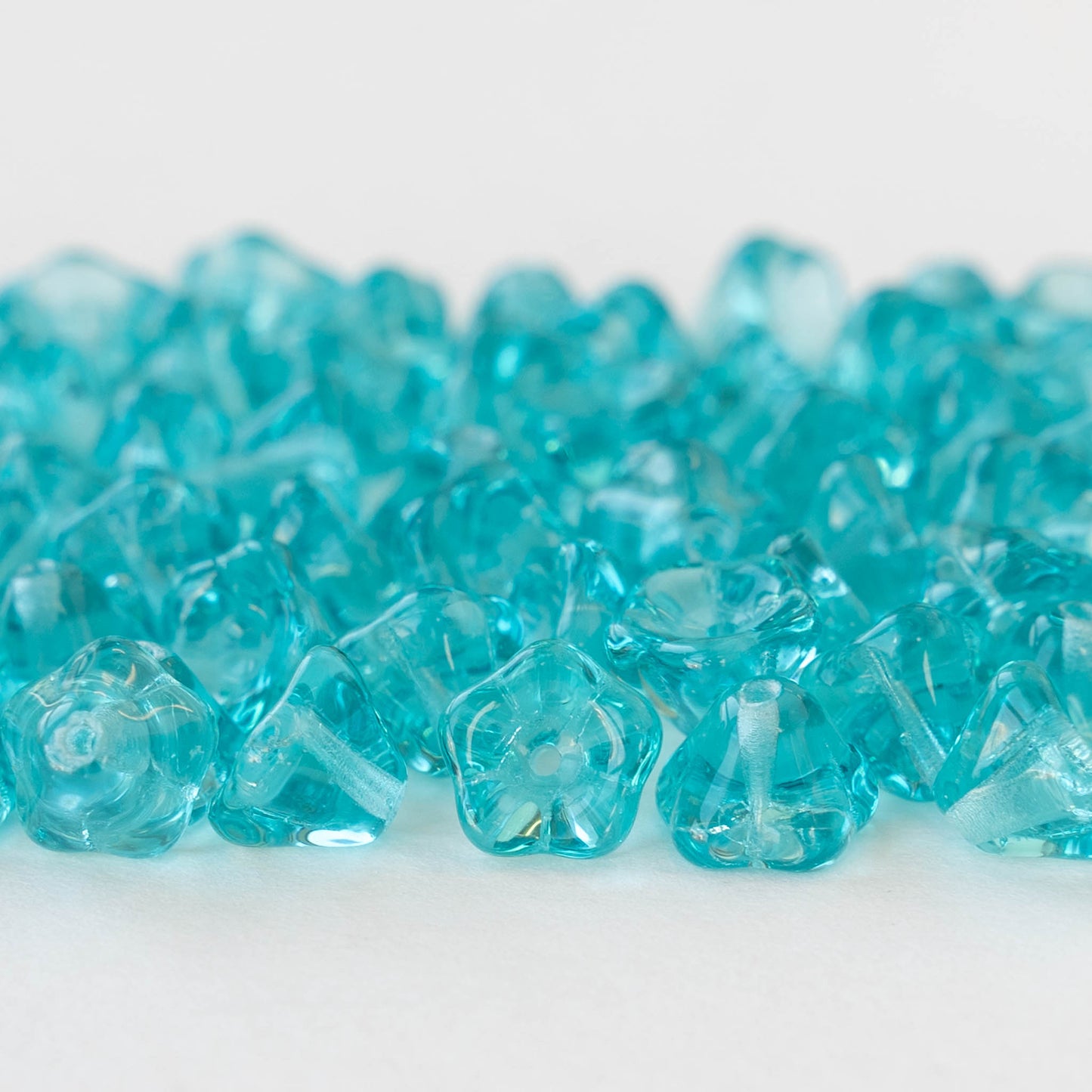 6x8mm Glass Flower Beads - Transparent Aqua - 30 Beads