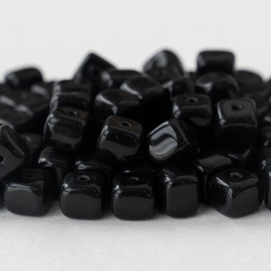 Load image into Gallery viewer, 6x9mmmm Glass Cube Beads - Opaque Black - 30 beads
