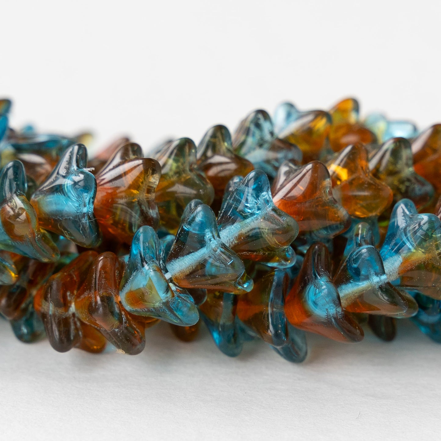 6x9mm Glass Bell Flower Beads - Transparent Aqua Amber Mix - 12 beads