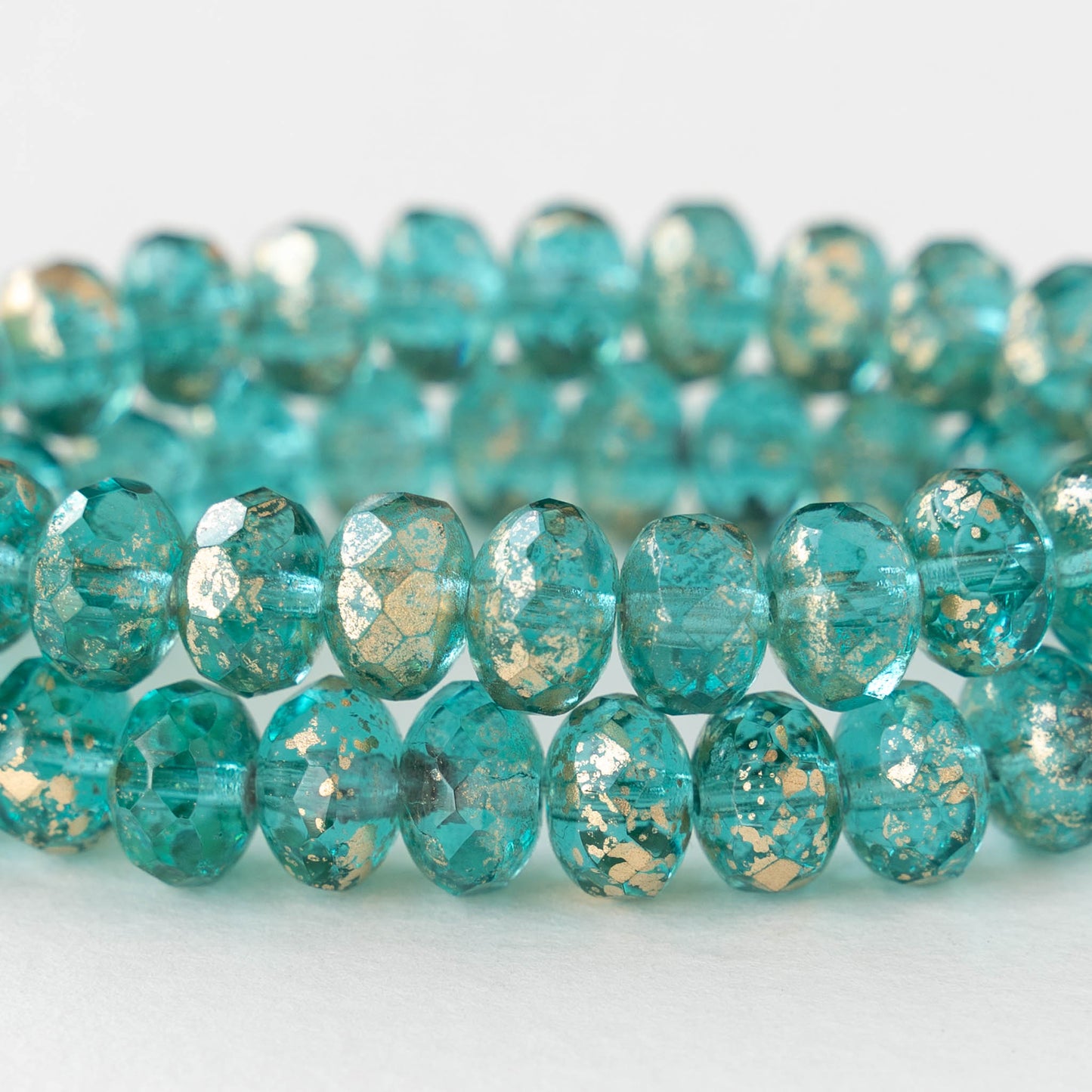 6x9mm Firepolished Rondelle Beads - Transparent Lt. Aqua with Gold Dust  - 25 Beads