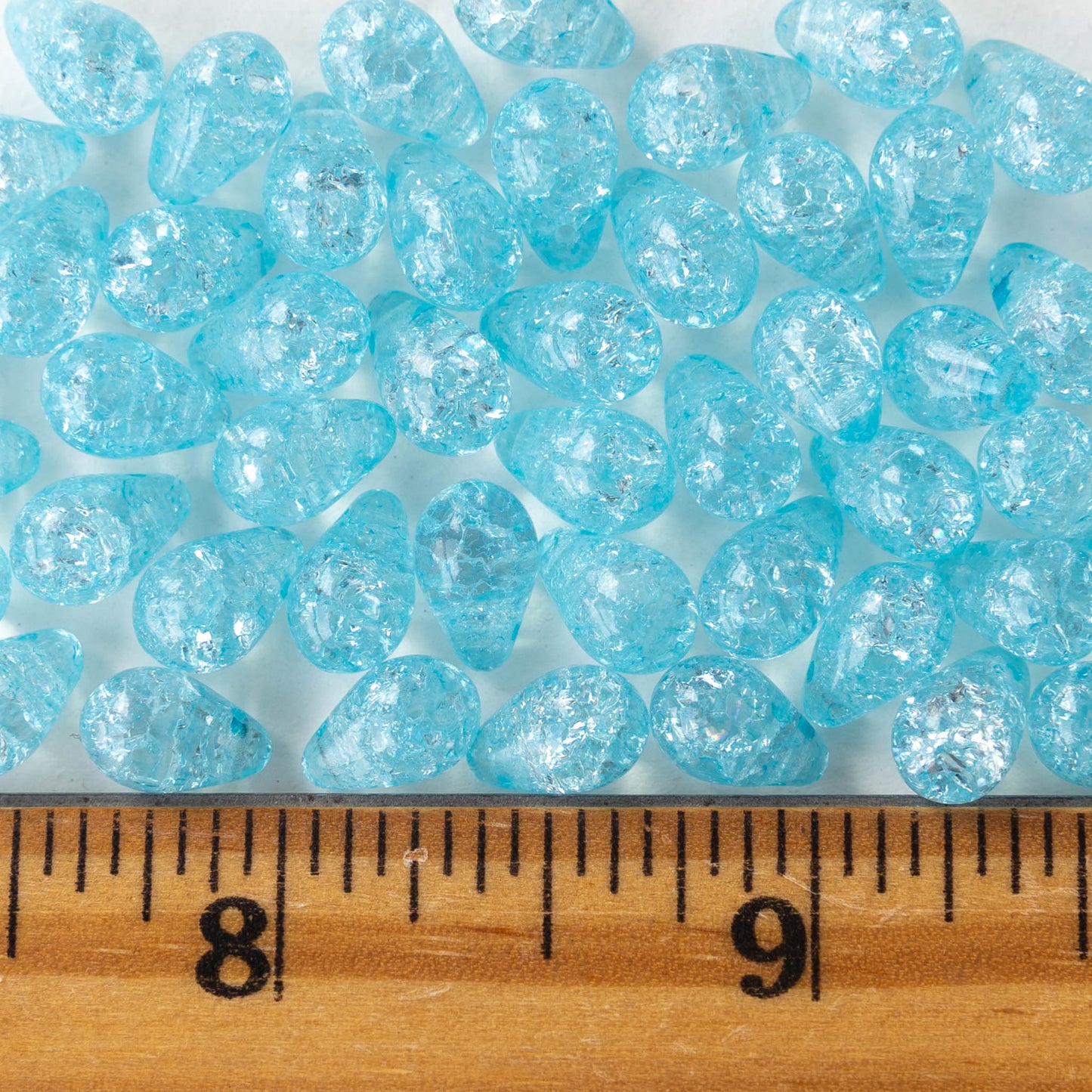 Load image into Gallery viewer, 6x9mm Glass Teardrop Beads - Lt. Aqua Crackle - 50 Beads
