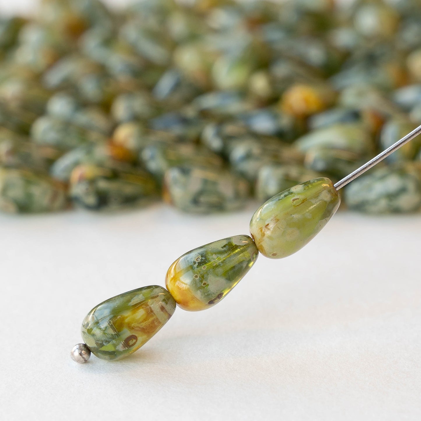 6x9mm Glass Teardrop - Green Amber Picasso - 30 Beads