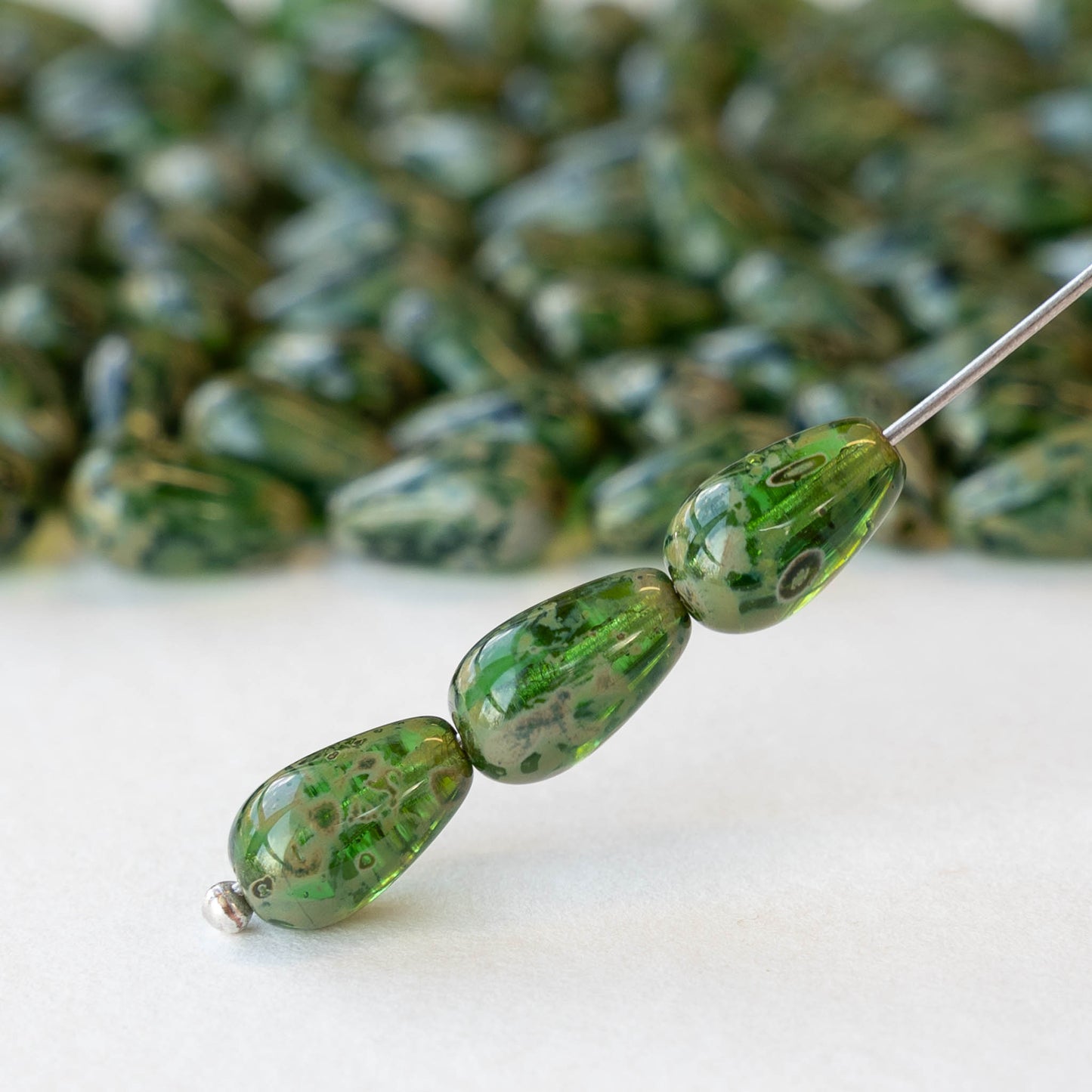 6x9mm Glass Teardrop - Opaque Green Picasso - 30 Beads