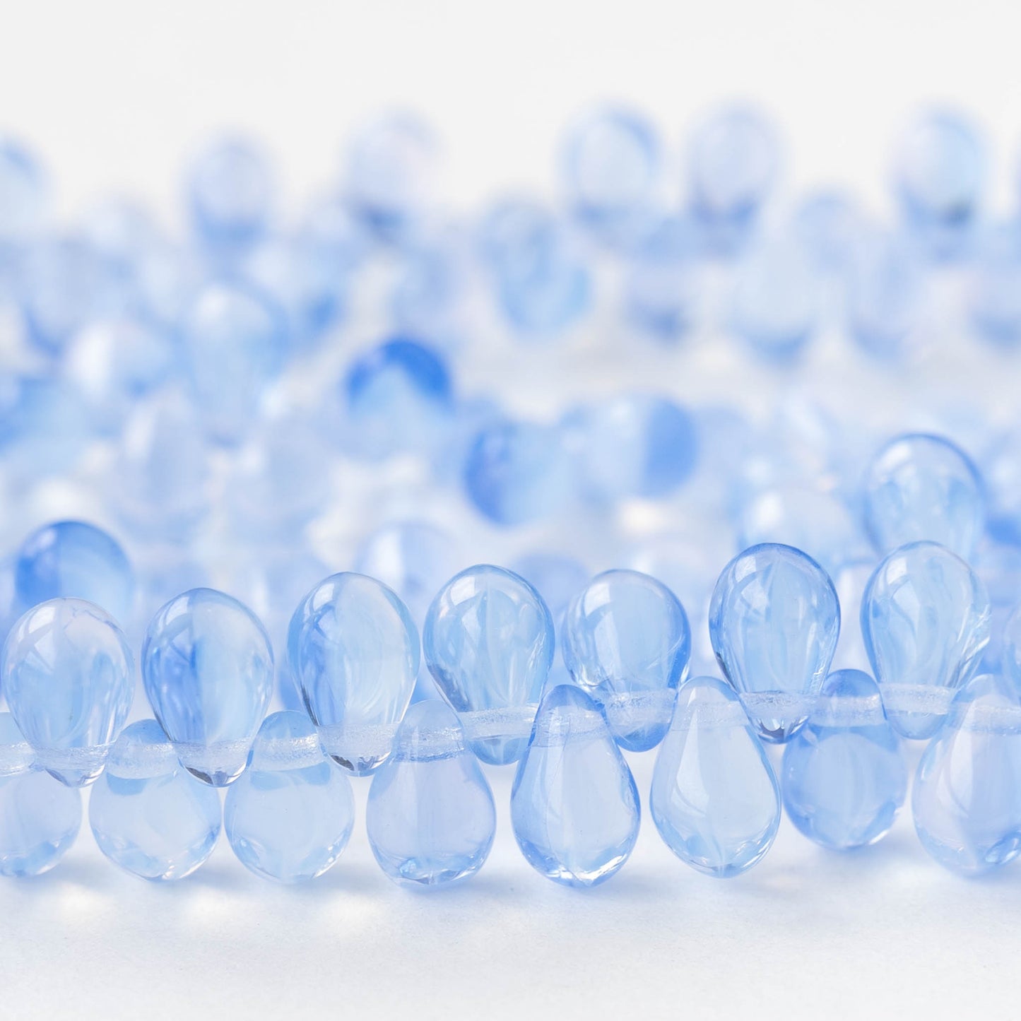 6x9mm Glass Teardrop Beads - Transparent Light Blue Mix - 30 Beads