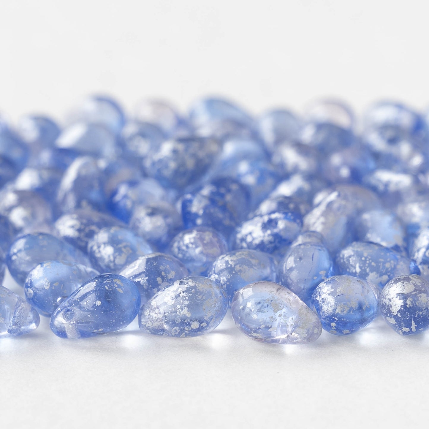 6x9mm Glass Teardrop Beads - Light Sapphire Blue with Silver Dust - 30 Beads