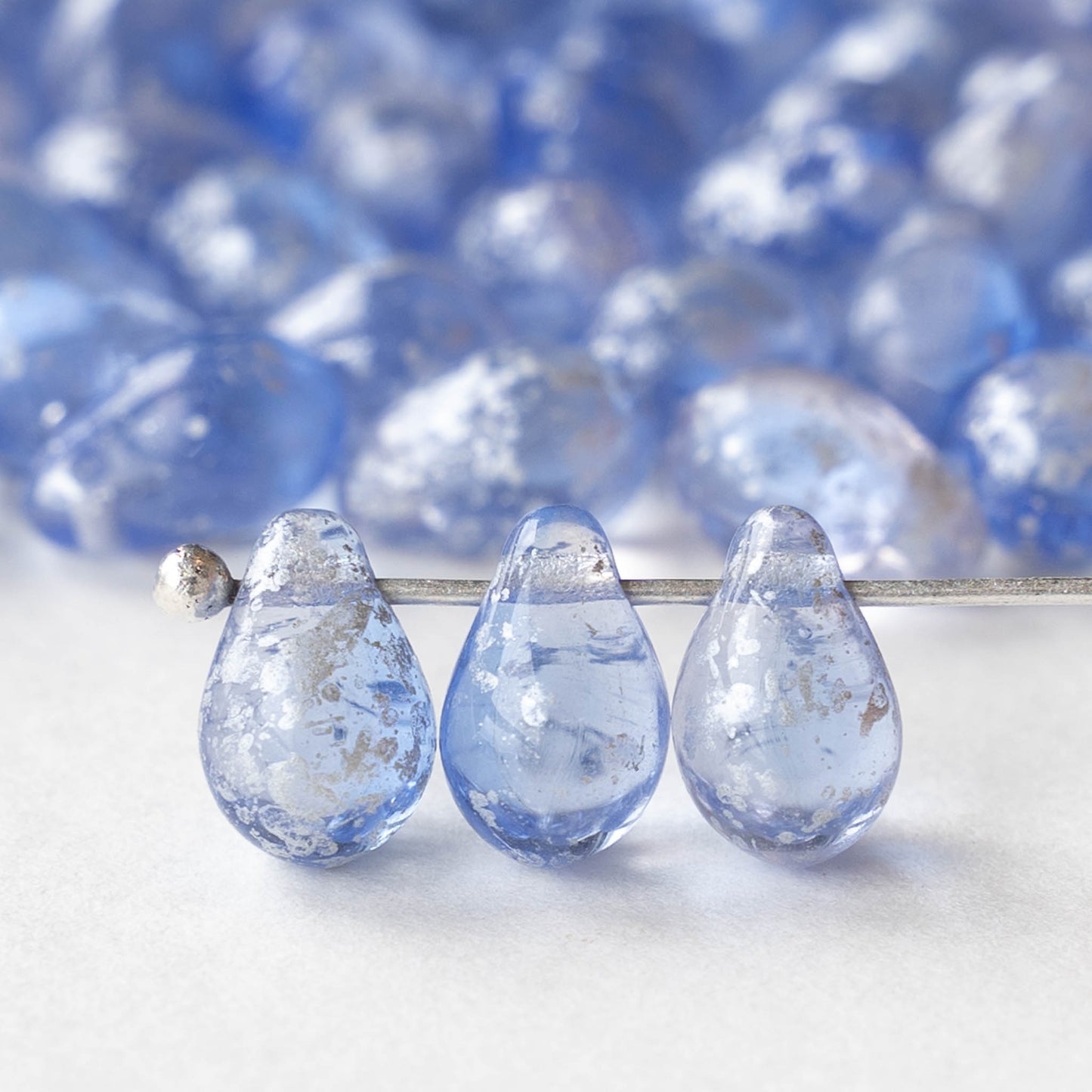 6x9mm Glass Teardrop Beads - Light Sapphire Blue with Silver Dust - 30 Beads