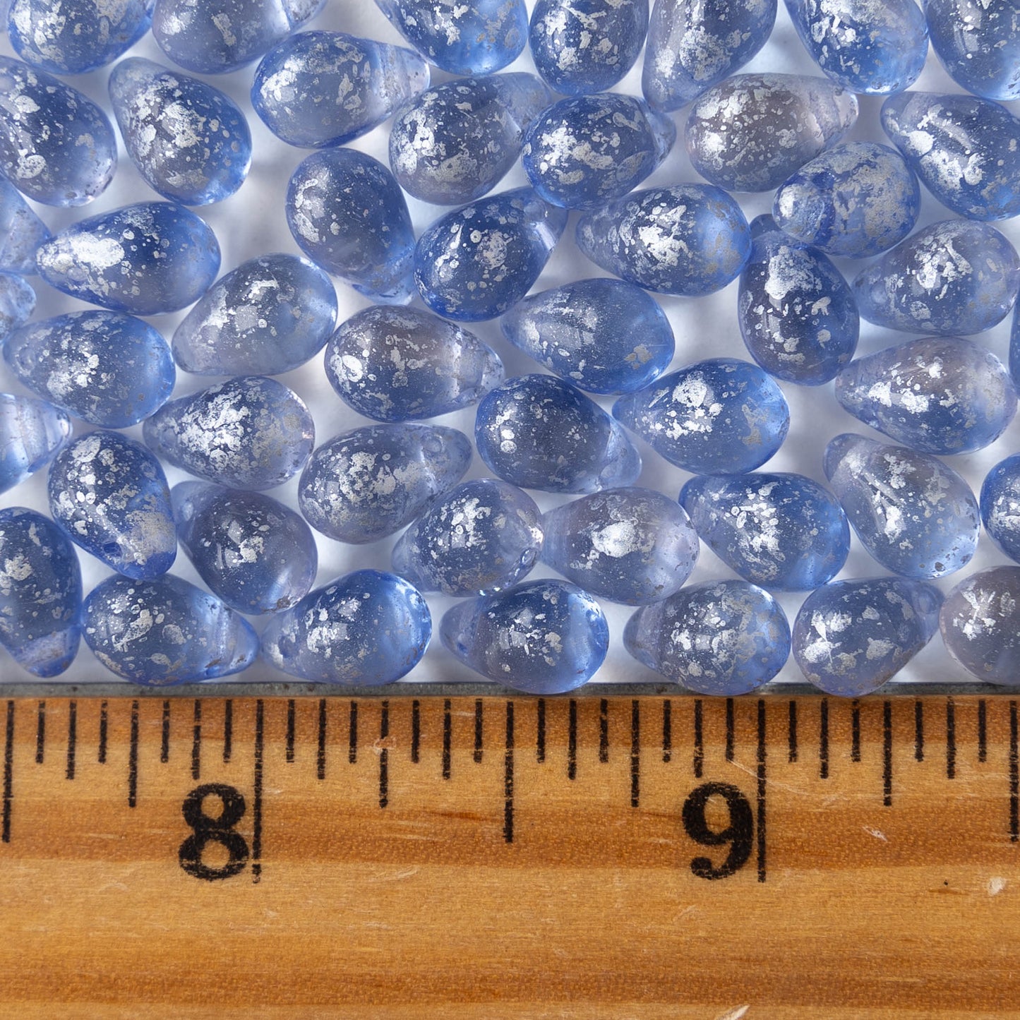 6x9mm Glass Teardrop Beads - Light Sapphire Blue with Silver Dust - 30 Beads