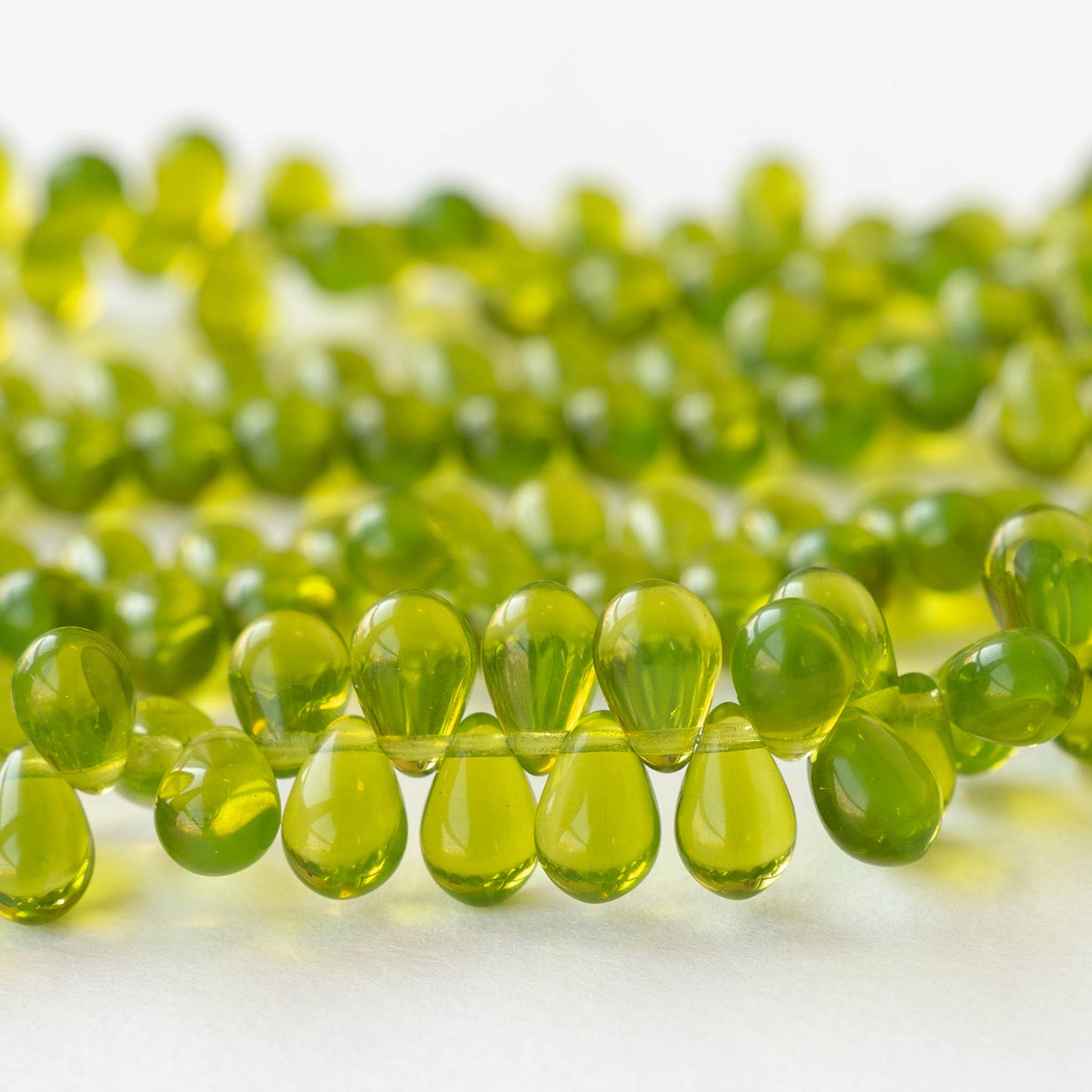 6x9mm Glass Teardrop Beads - Transparent Lime Green - 30 Beads