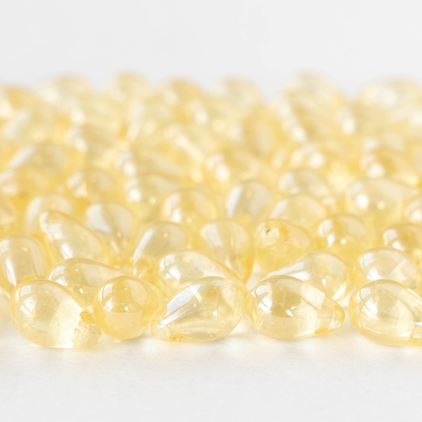 6x9mm Glass Teardrop - Transparent Pale Yellow Luster - 30 Beads