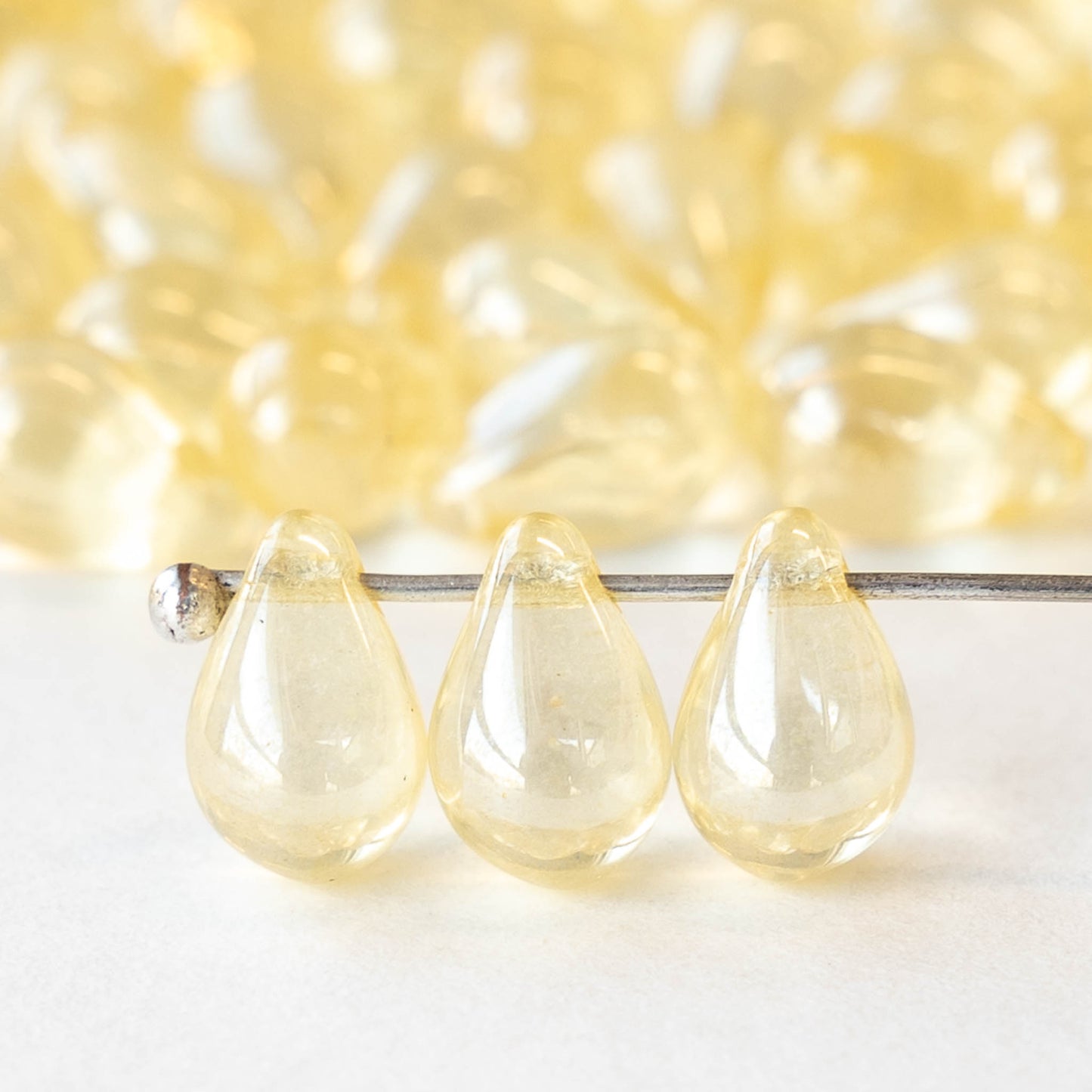 6x9mm Glass Teardrop - Transparent Pale Yellow Luster - 30 Beads