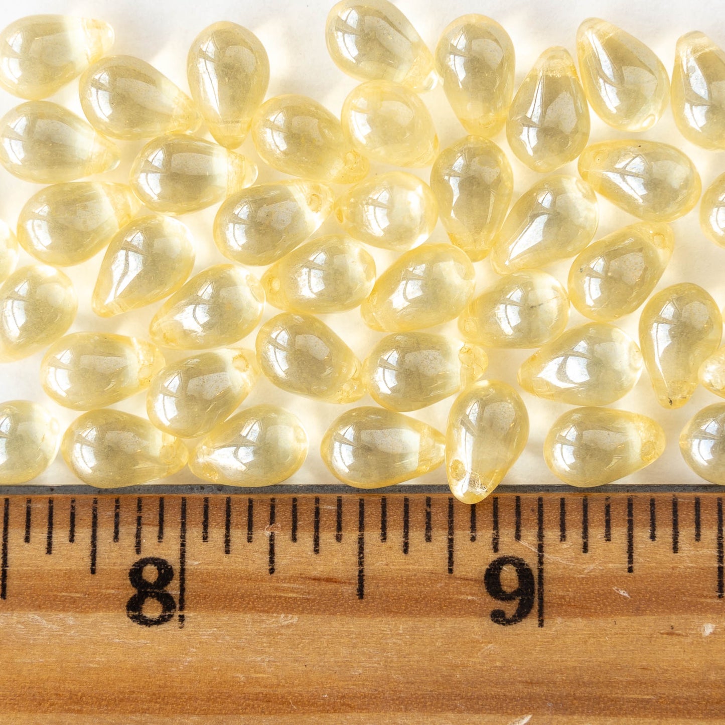 6x9mm Glass Teardrop - Transparent Pale Yellow Luster - 30 Beads