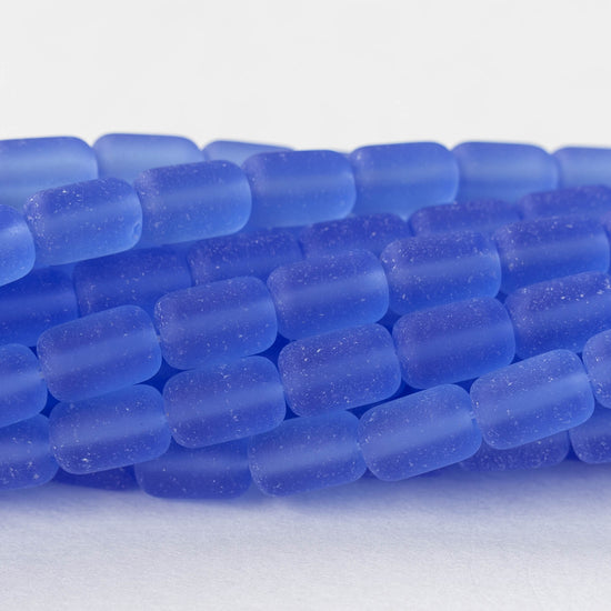 Load image into Gallery viewer, 6x9mm Frosted Glass Tube Beads - Sapphire Blue - 26 beads
