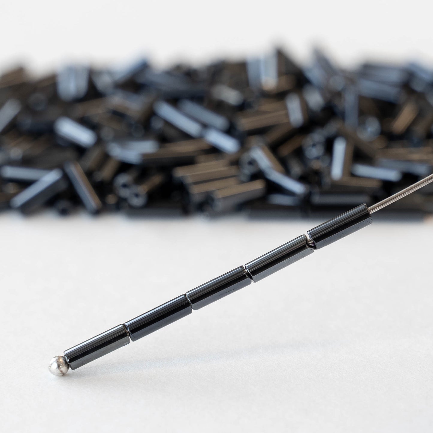 7mm Glass Bugle Beads - Sphinx Gunmetal - 24 grams ~400 beads