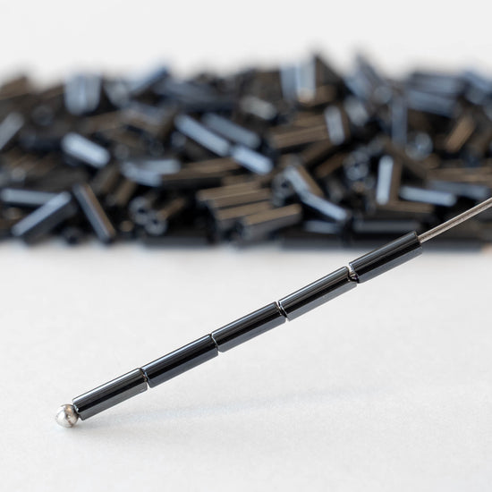7mm Glass Bugle Beads - Sphinx Gunmetal - 24 grams ~400 beads