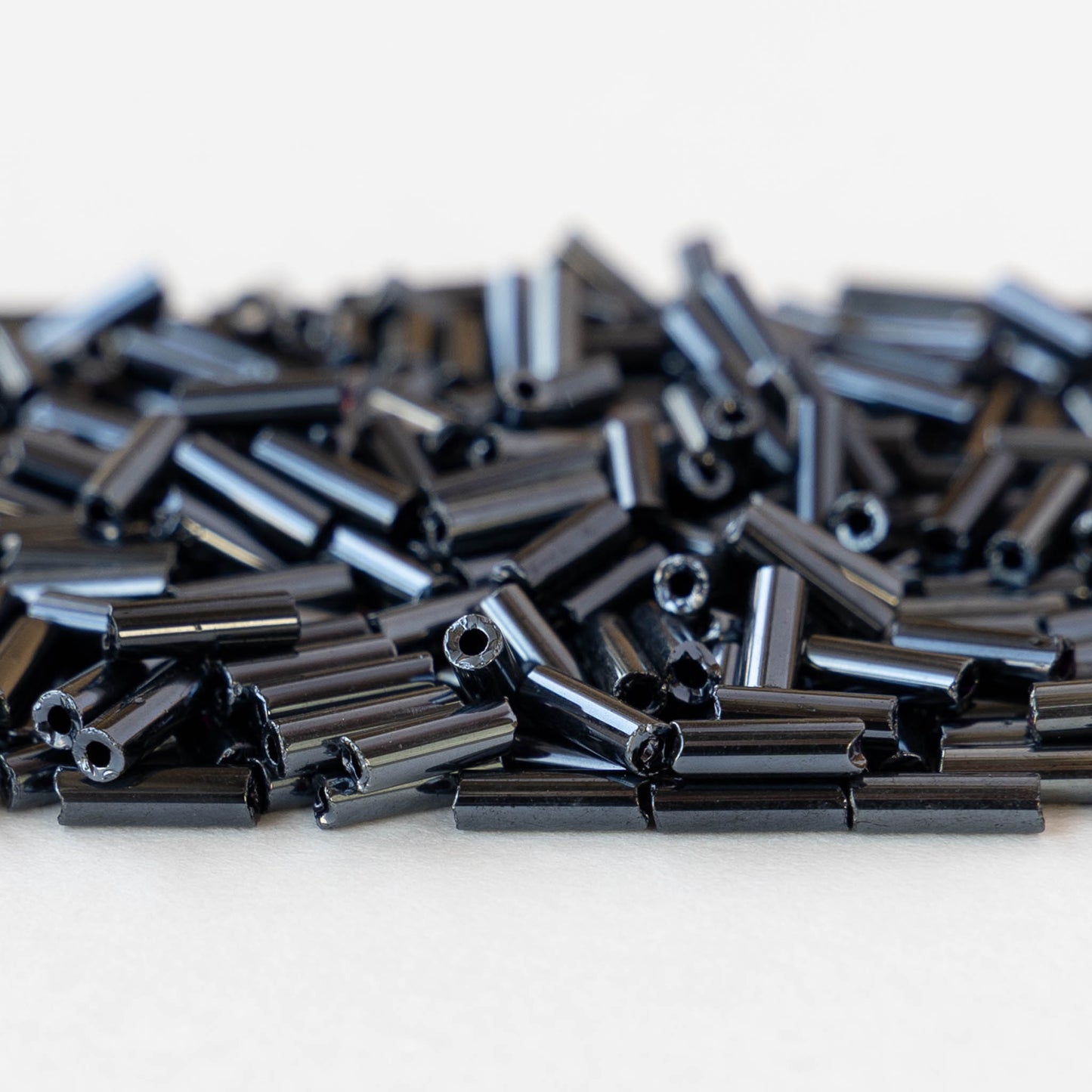 7mm Glass Bugle Beads - Sphinx Gunmetal - 24 grams ~400 beads