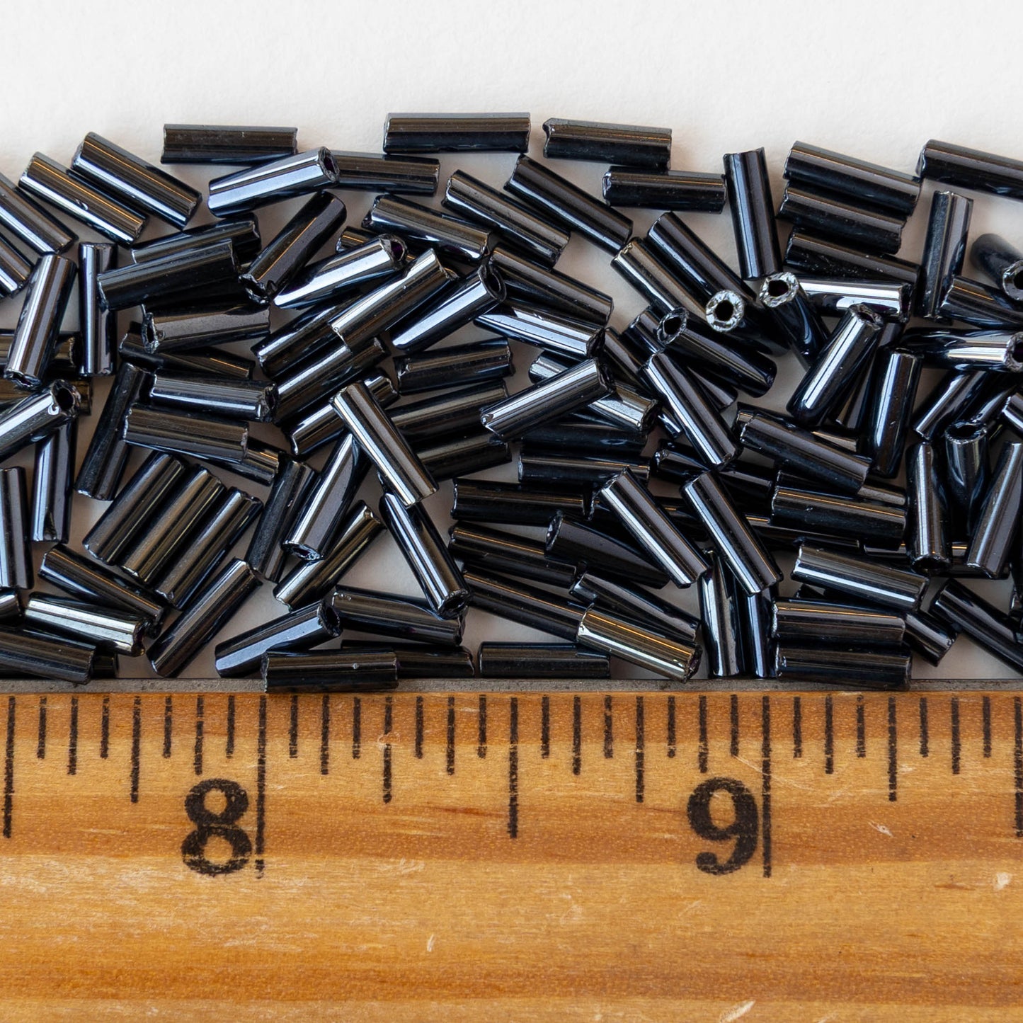 7mm Glass Bugle Beads - Sphinx Gunmetal - 24 grams ~400 beads