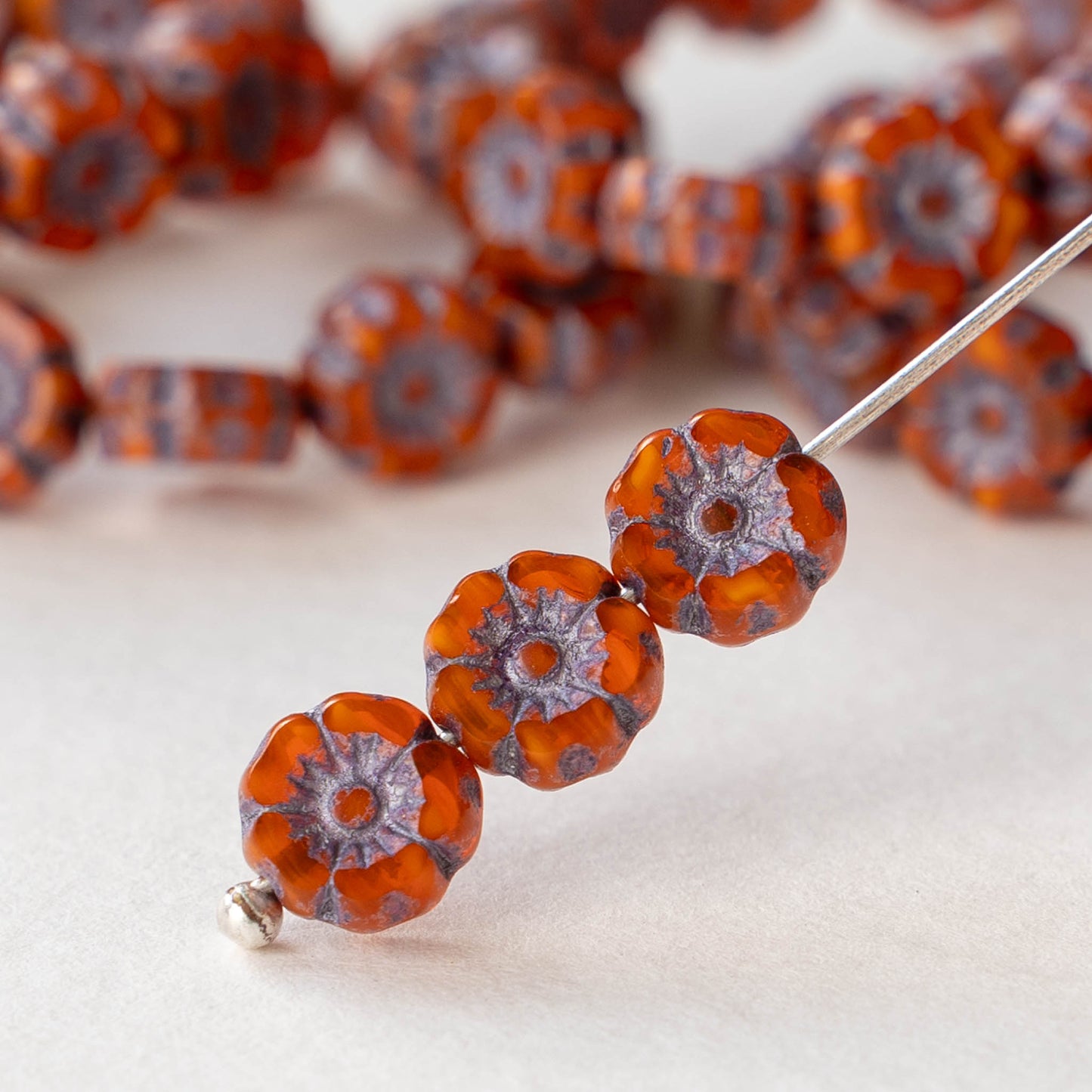 7mm Glass Flower Beads - Orange opaline with lavender Wash - 12 Beads