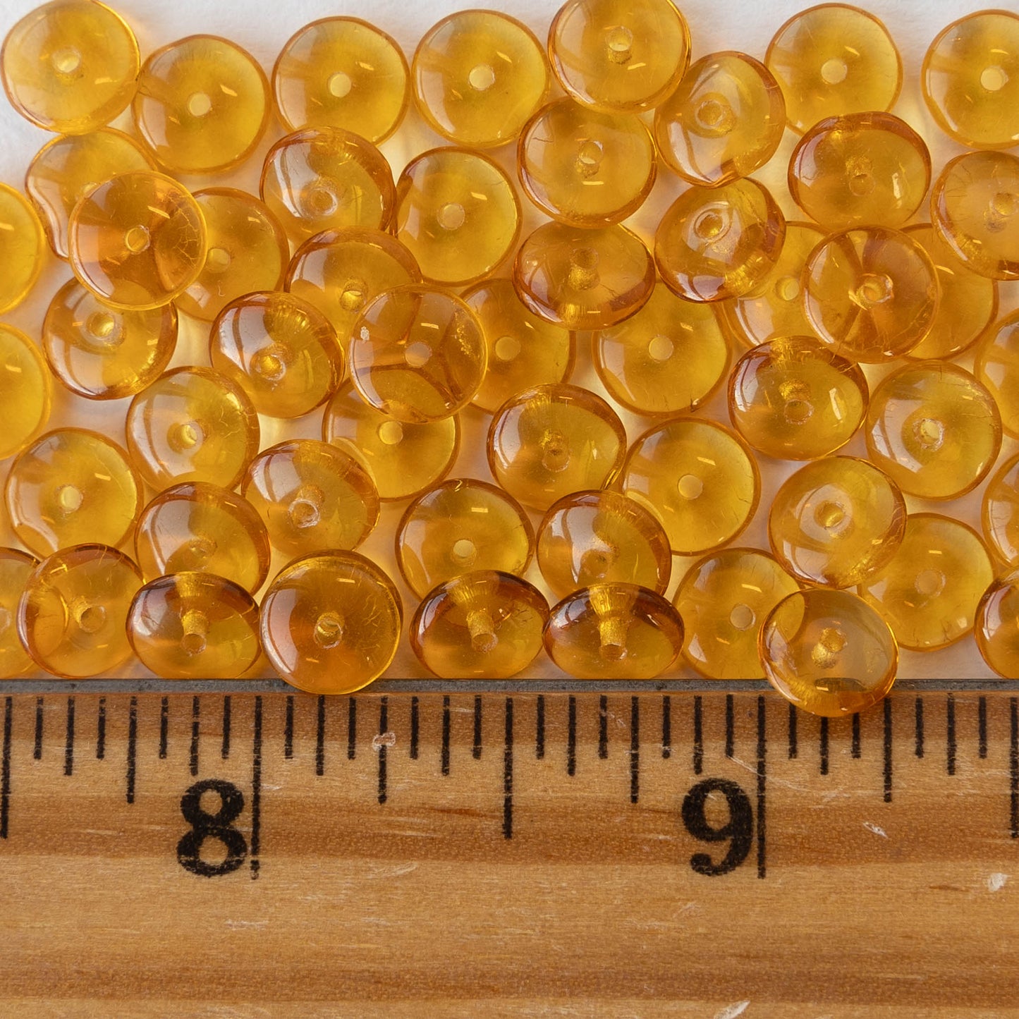 7mm Rondelle Beads - Md. Amber - 100 Beads